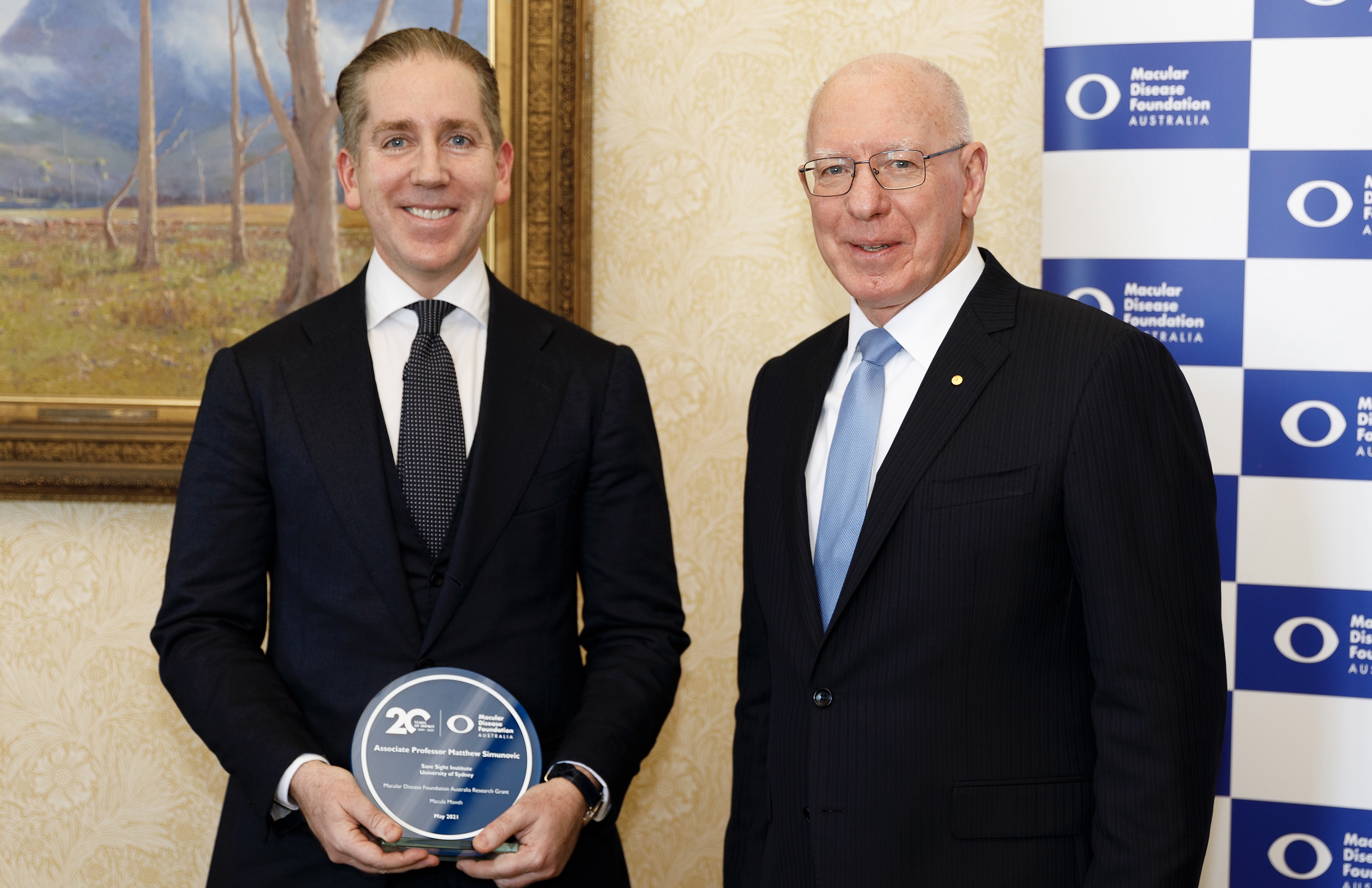 Prof Simunovic pictured with the Governor General receiving a major grant awarded by the Macular Disease Foundation Australia.